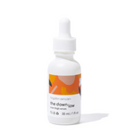 A white bottle with a dropper containing the Down Low Inner Thigh Serum, labeled with a colorful design.